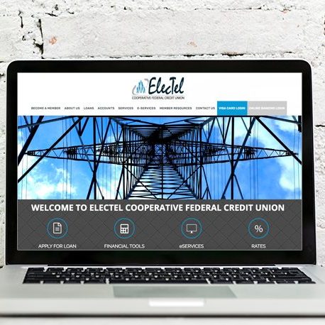 ElecTel website on laptop