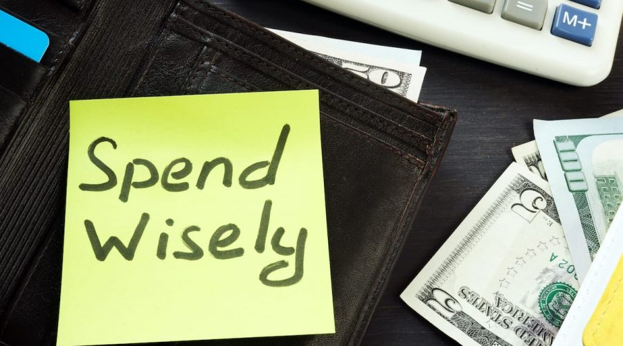 Open wallet with memo spend wisely. Money habits.
