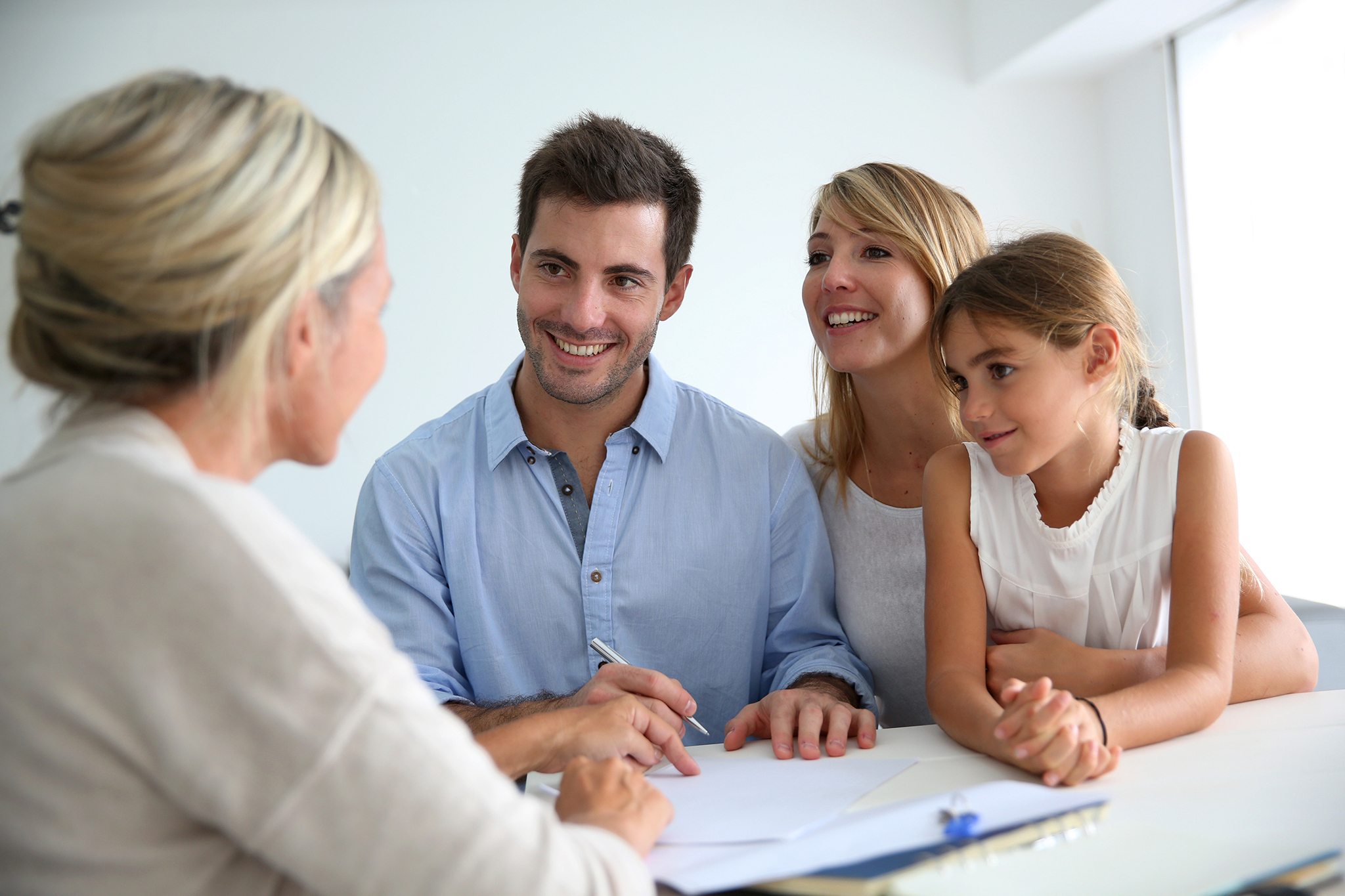 Family meeting real-estate agent for house investment